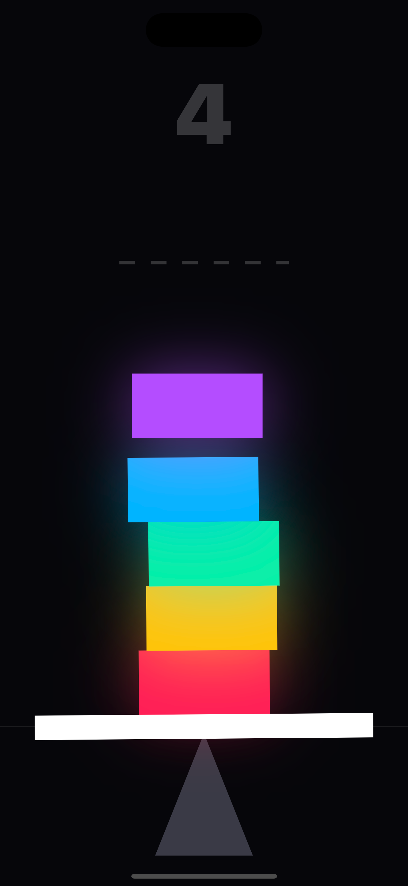 Five blocks stacked on the platform with the next block falling